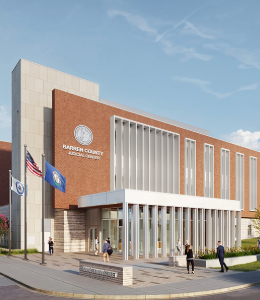  Modern brick and glass courthouse labeled ‘Barren County Judicial Center,’ with several people walking near the entrance.