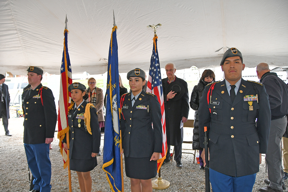 Military color guard at outdoor ceremony