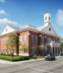  Modern brick courthouse labeled ‘Crittenden Judicial Center,’ with several people walking near the entrance.