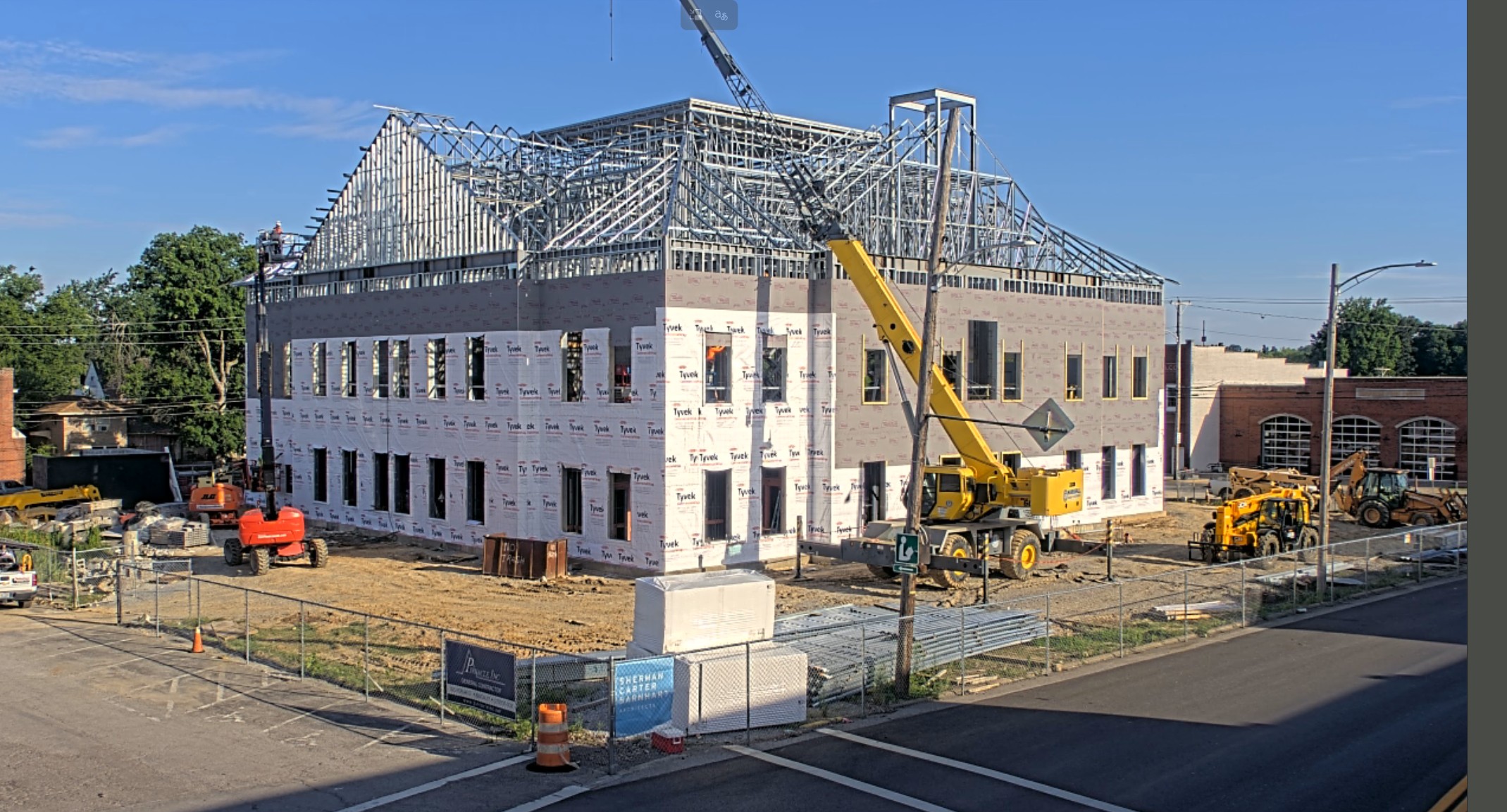 Exterior of a construction crew building a judicial center.