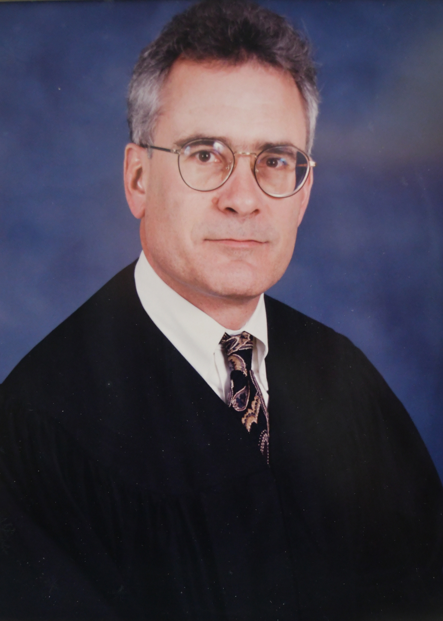Official portrait of Justice David C. Buckingham. 