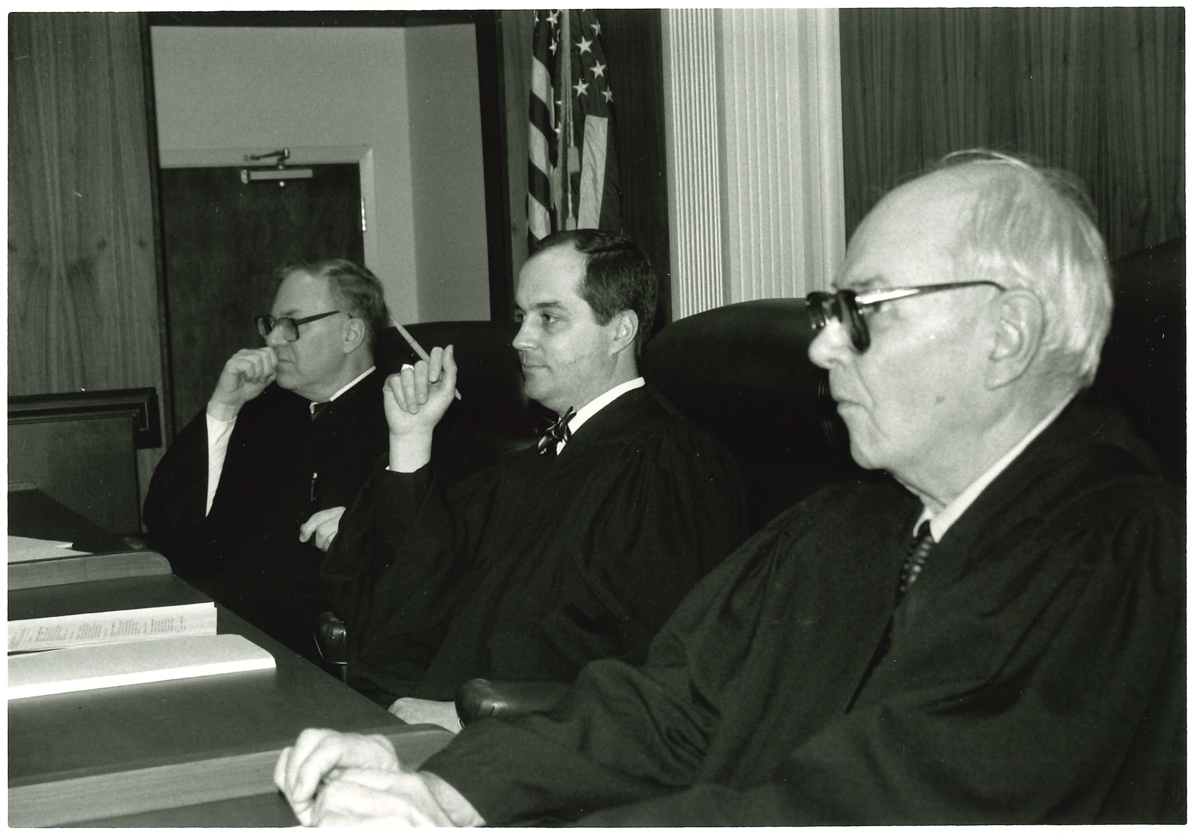 Judge Dyche on the bench listening to an argument. 