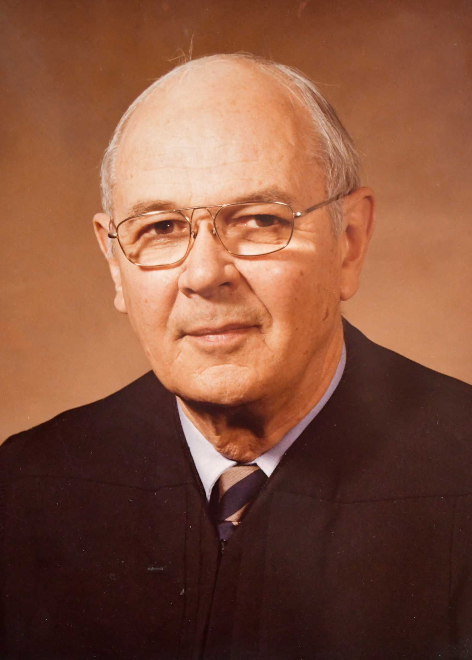 Official portrait of Justice Charles H. Reynolds. 