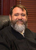 Official portrait of Judge Greogy Coulson.